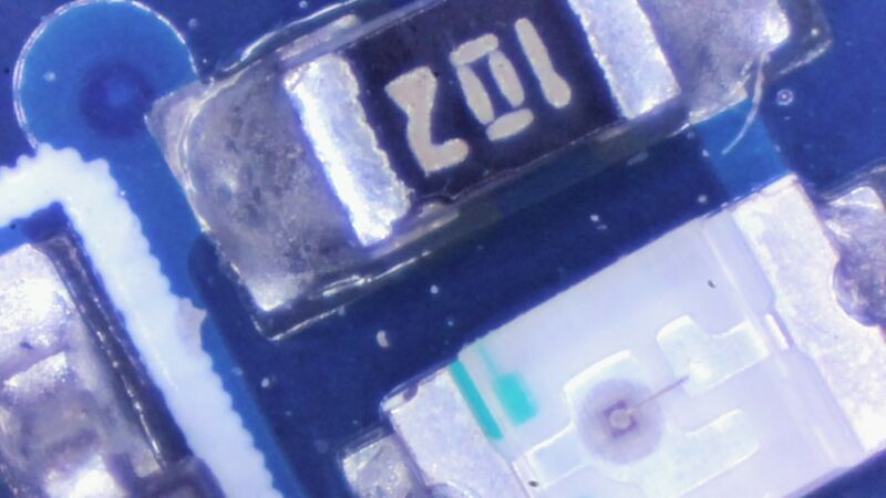 Photo of LED next to 10kΩ resistor